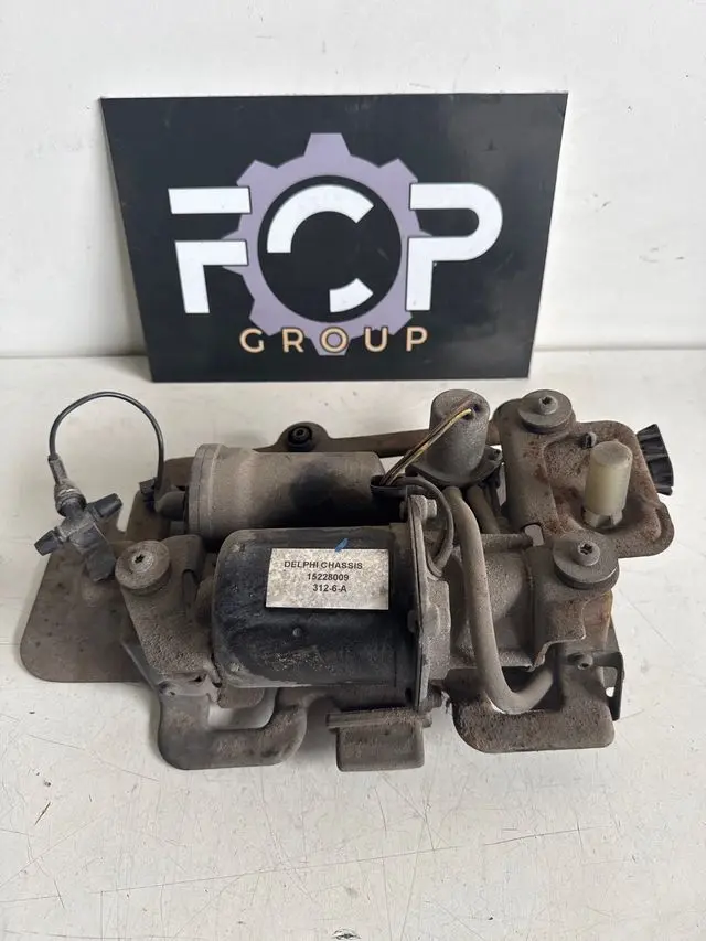 Compresor de Suspensión Neumática Cadillac SVX / STS 2003-2009          Referencia original : 15228009